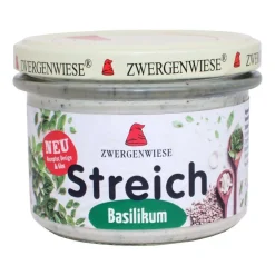 Laktosefreier Aufstrich mit Basilikum auf Weißbrot ein Genuß